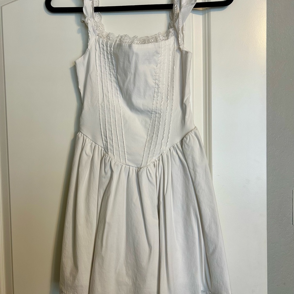 White Sleeveless Dress with Lace Trim